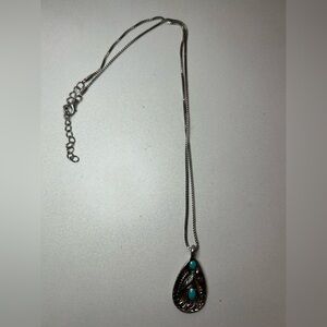 Elegant Silver and Turquoise Pendant Necklace